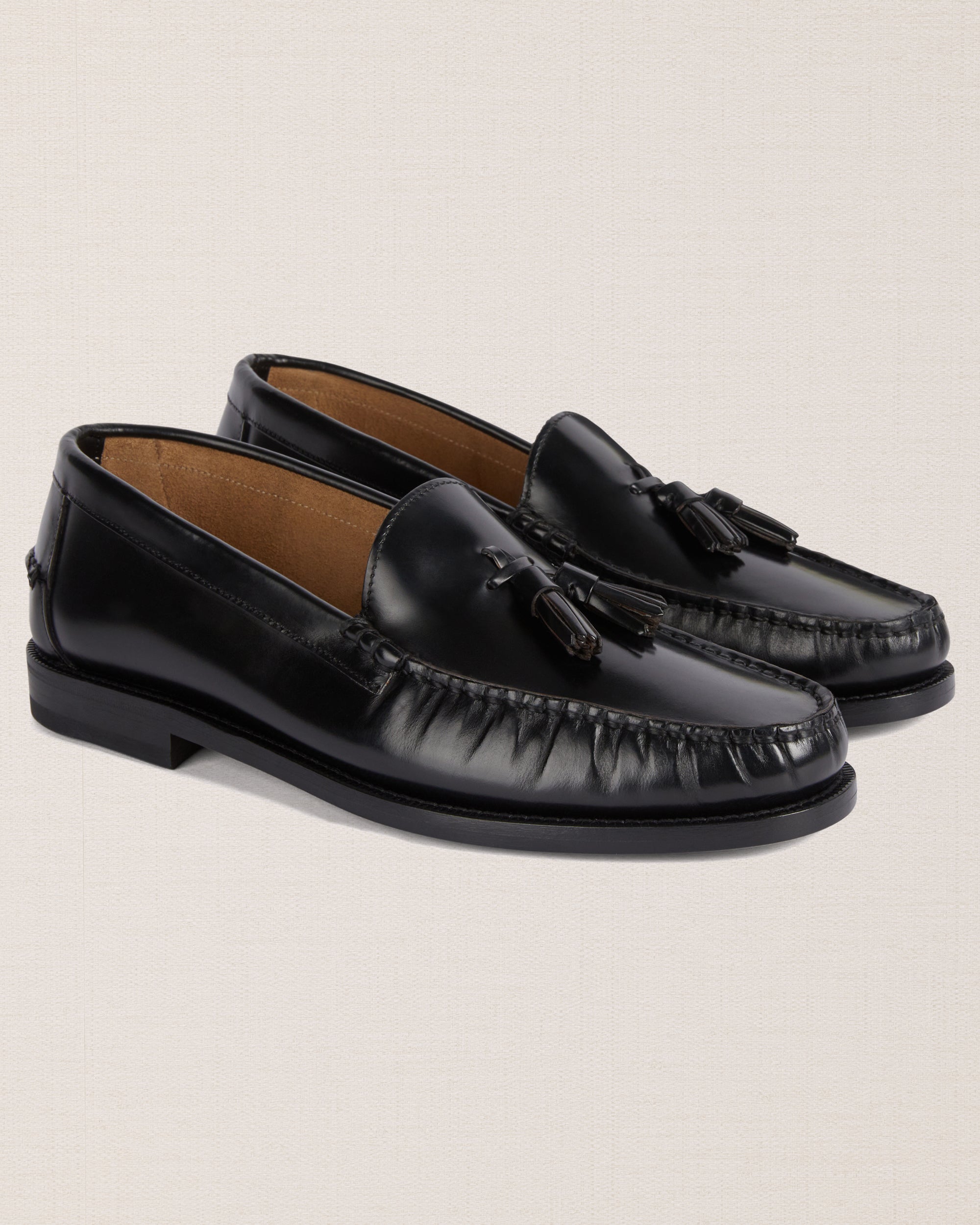 Velasca | Black leather tasseled loafers. Made in Italy