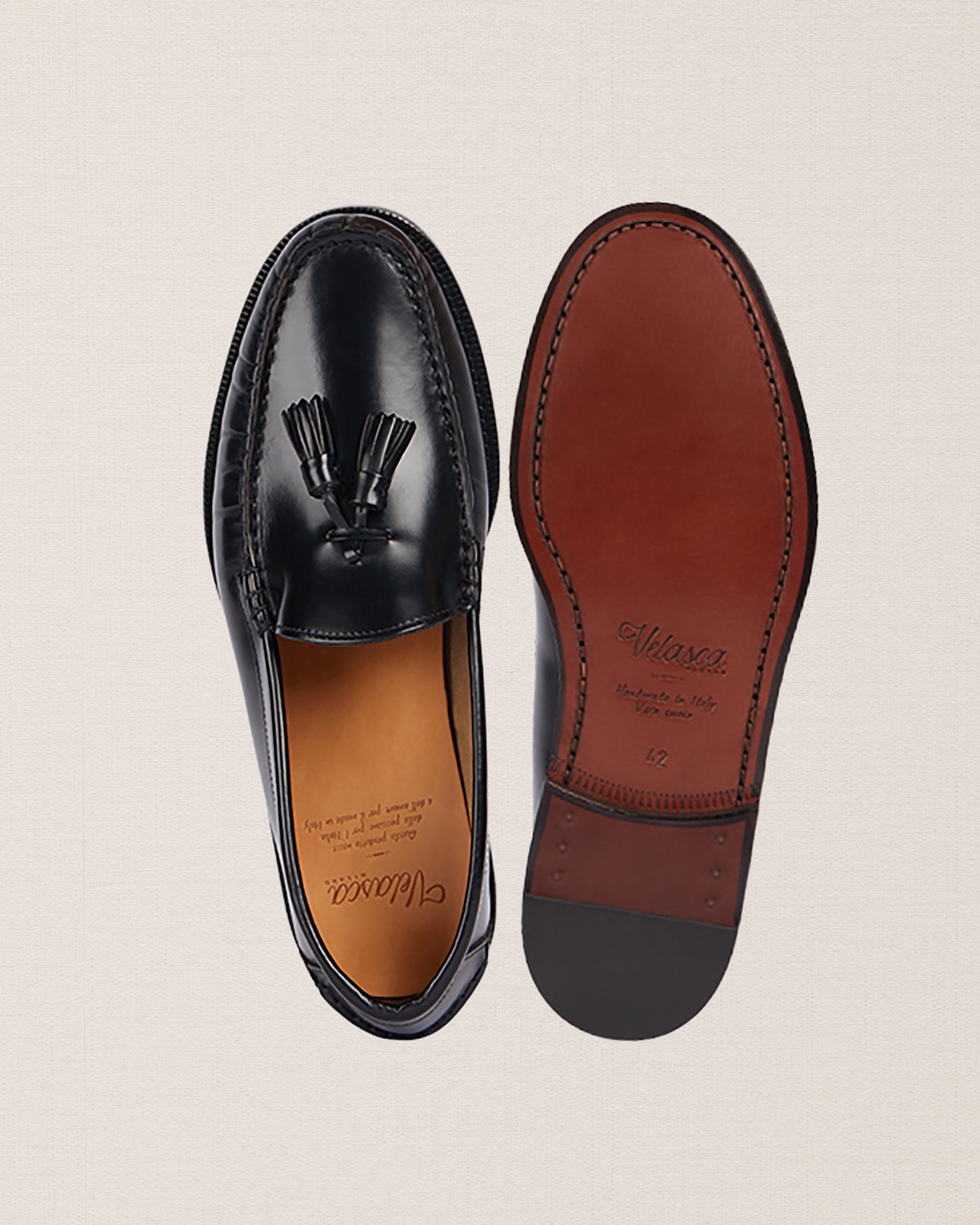 Velasca | Black leather tasseled loafers. Made in Italy